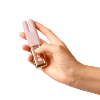 Le Wand Deux Clitoris Vibrator Held In Hand