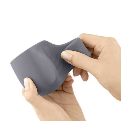 Le Wand Loop Silicone Attachment Held In Hand
