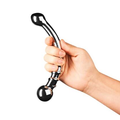 Le Wand Bow Dildo Held In Hand