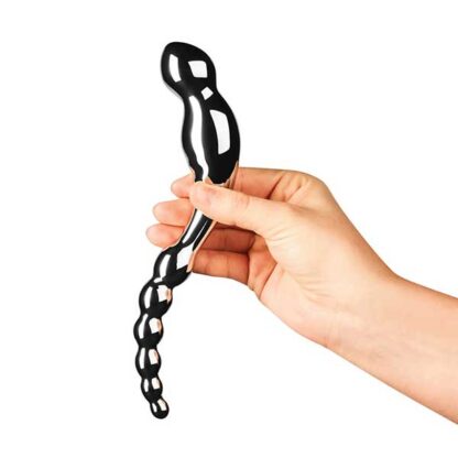Le Wand Swerve Dildo Held In Hand