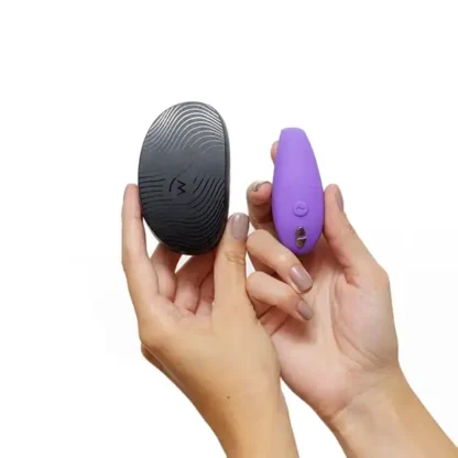 We-Vibe Sync Go and Travel Case Held In Hand
