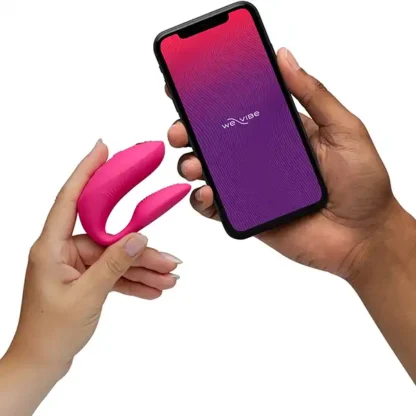 We-Vibe Chorus Pro Couple's Vibrator Held By Smartphone